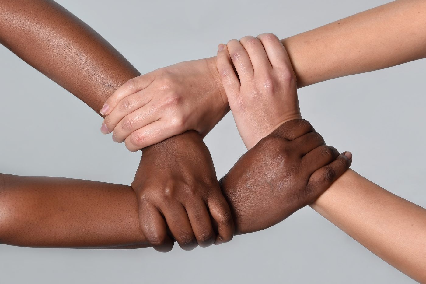 black and white hands holding